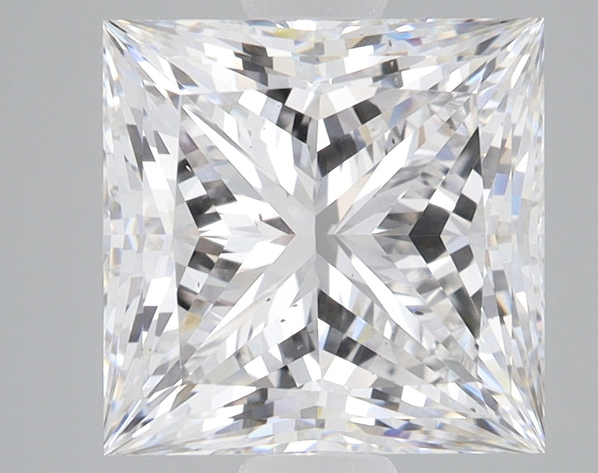 Princess-cut lab-grown diamond with brilliant faceting and light refraction on gray background.