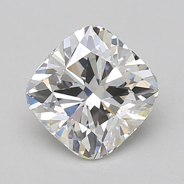 Cushion-cut lab-grown diamond with faceted surface and clear sparkle on neutral gray background.