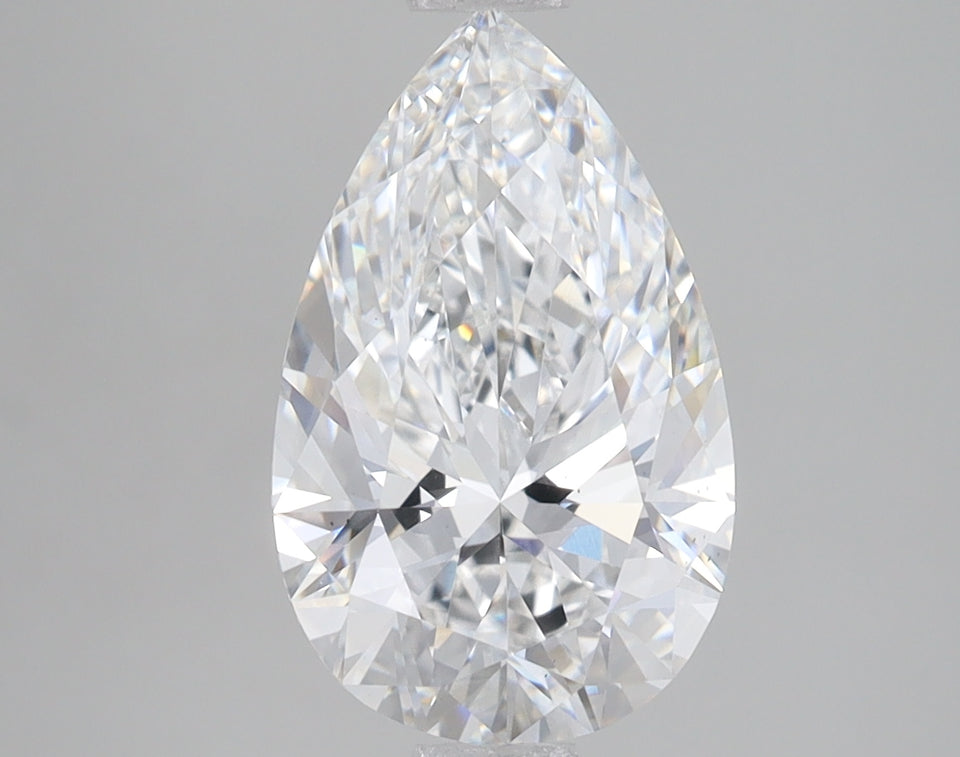 Clear pear-shaped lab-grown diamond with faceted surface and light reflections on neutral background.