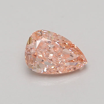 Pear-shaped lab-grown diamond with faceted surface and light peachy-pink hue on neutral background.