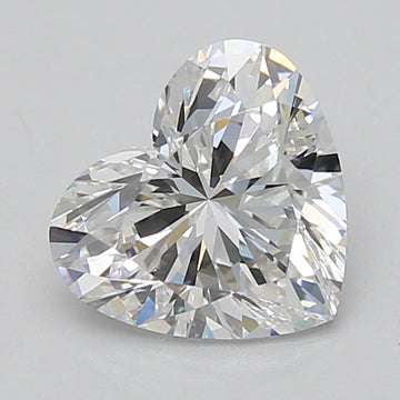 Heart-shaped lab-grown diamond with faceted cut and colorless appearance on neutral background.