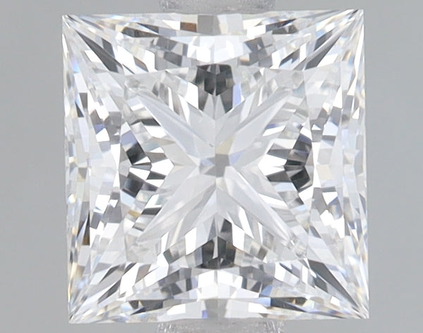 Clear princess-cut lab-grown diamond with faceted surfaces reflecting light, displayed against neutral gray background.