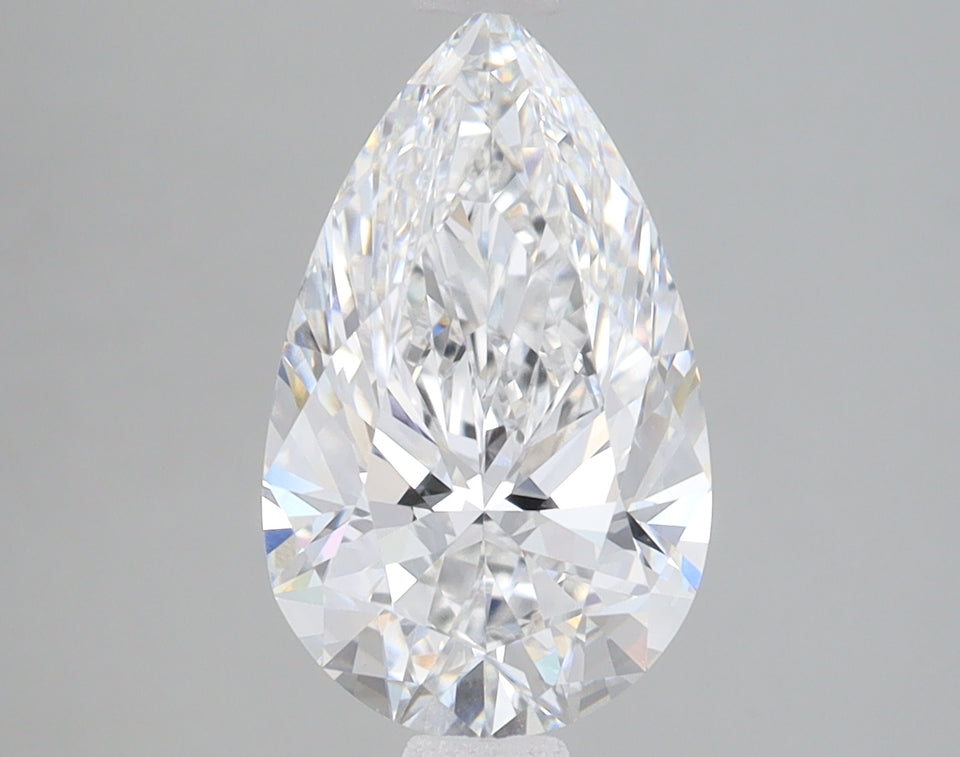 Pear-shaped clear diamond with faceted cuts reflecting light, displayed against neutral background.