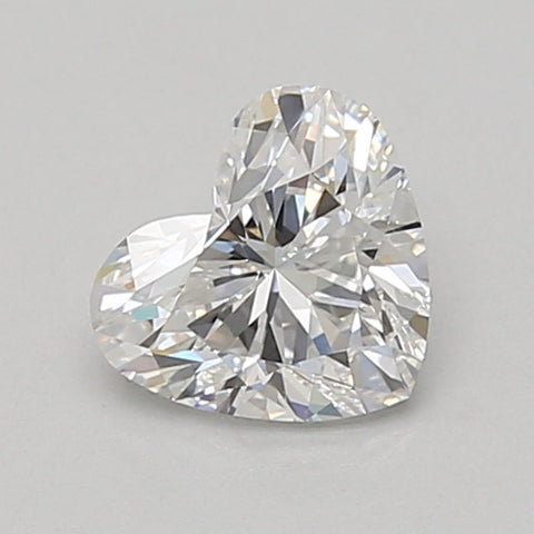 Heart-shaped lab-grown diamond with faceted surfaces and clear brilliance, 0.87 carat loose stone.