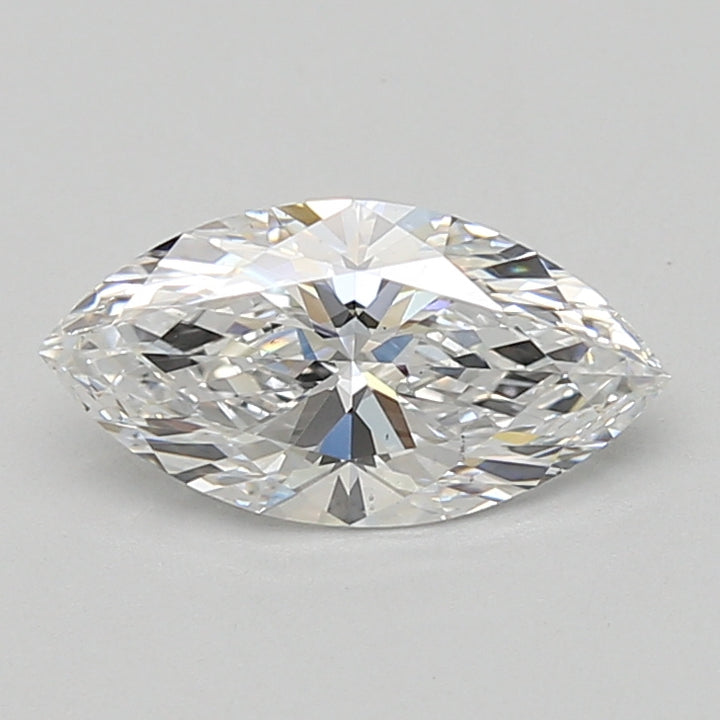 Marquise cut diamond with faceted surface and light reflections on neutral background.