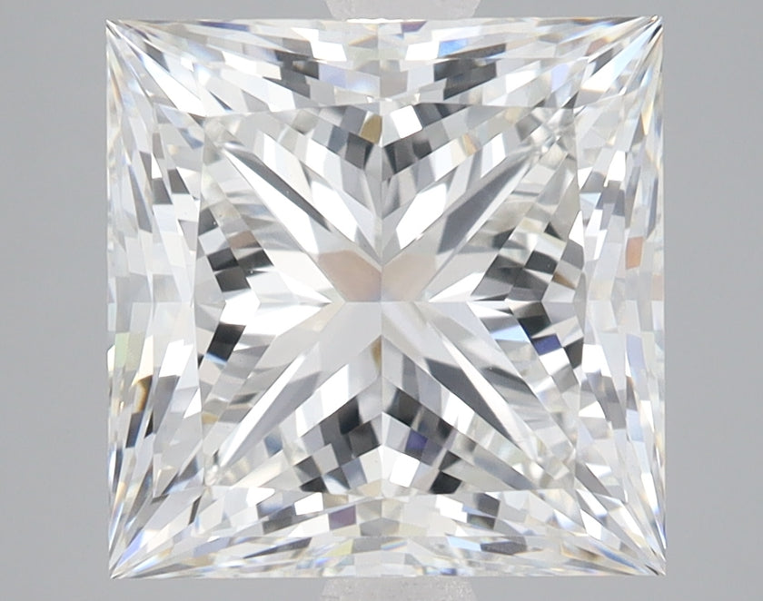 Square-cut lab-grown diamond with faceted surface reflecting light, displayed on neutral background.
