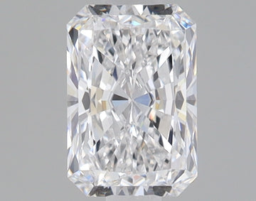 Colorless radiant-cut loose diamond with faceted surfaces reflecting light on neutral gray background.