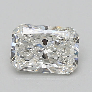 Radiant cut loose diamond with clear faceting and light reflection on neutral background.