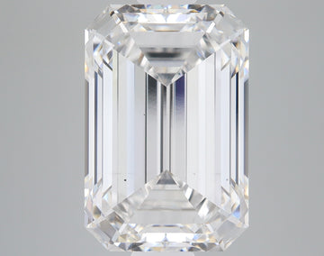 Emerald-cut lab-grown diamond with faceted surfaces displaying light refraction, approximately 5.73 carats.