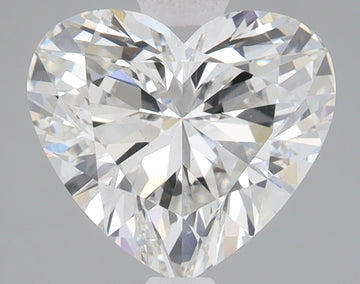 Clear heart-shaped diamond with brilliant faceting and light refraction, displayed against neutral gray background.