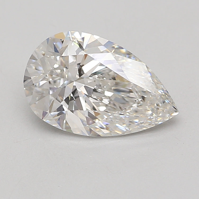 Pear-shaped clear lab-grown diamond with faceted surfaces and light reflections on neutral background.