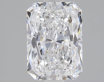 Radiant cut loose diamond with clear faceting and light reflection on neutral gray background.