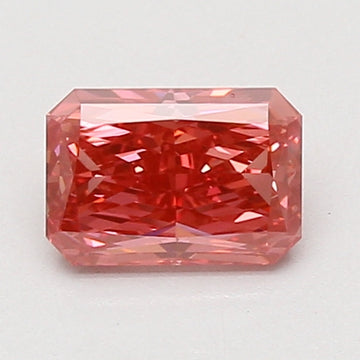 Radiant cut lab-grown diamond with pink-red coloring and faceted surface against white background.