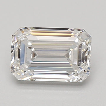 Emerald-cut lab-grown diamond with clear facets and reflective surfaces on neutral background.