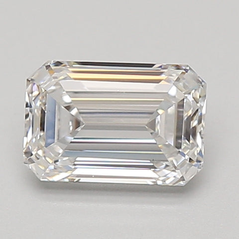Emerald-cut lab-grown diamond with clear facets and reflective surfaces on neutral background.