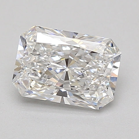 Radiant cut lab grown diamond with faceted surfaces reflecting light, displayed on neutral gray background.
