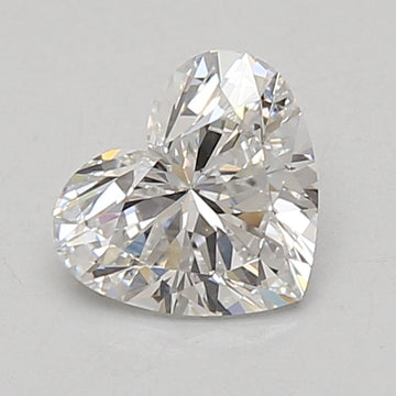 Heart-shaped lab-grown diamond with faceted surface, 0.97 carat, on neutral background.