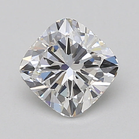 Cushion cut lab grown diamond with faceted surface reflecting light, displayed on neutral background.