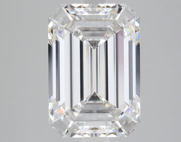 Emerald-cut lab-grown diamond with clear facets and light refraction on gray background.