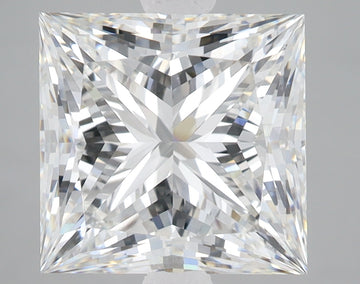 Princess cut lab grown diamond with faceted surface reflecting light, displayed against neutral gray background.