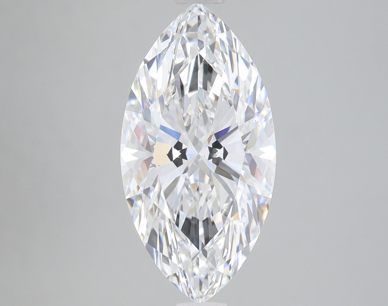 Marquise-cut colorless diamond with faceted surfaces and reflective light patterns against neutral background.