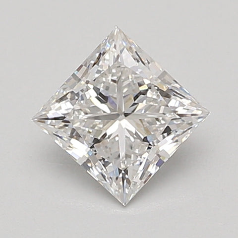 Princess-cut loose diamond with clear faceted surfaces and bright light reflection on neutral background.