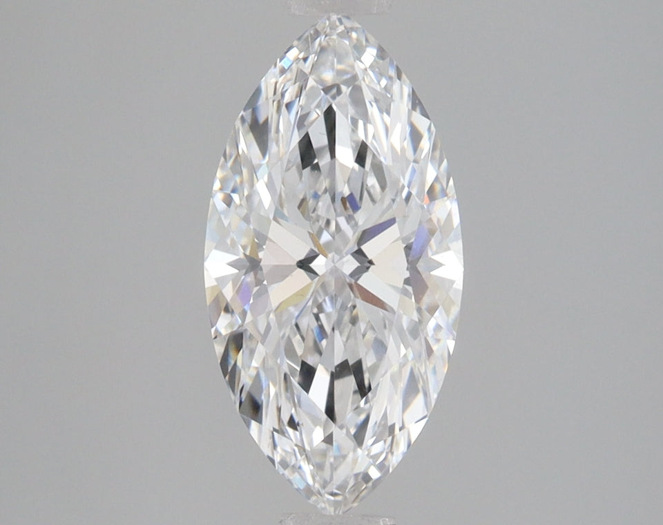 Marquise cut diamond with faceted surfaces reflecting light, displayed against neutral gray background.