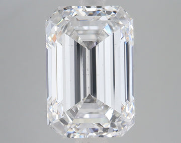 Emerald-cut faceted diamond with clear, colorless appearance and reflective surfaces against neutral gray background.