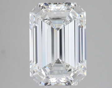 Emerald-cut lab-grown diamond with clear faceted surfaces and bright light refraction against a neutral background.