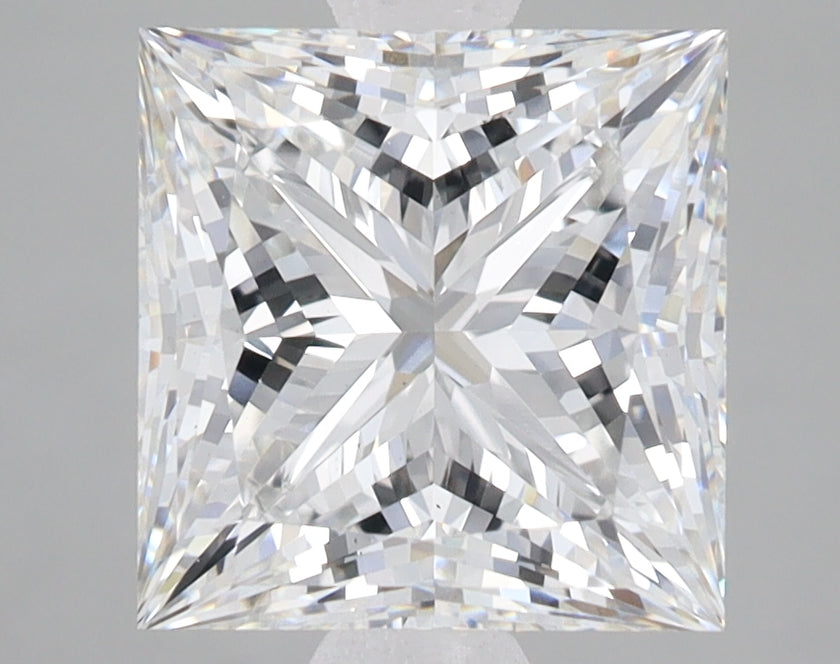 Princess cut lab-grown diamond loose stone with faceted surface and light reflections on neutral background.