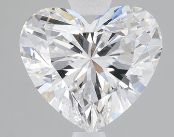 Heart-shaped lab-grown diamond with faceted surface and light reflections on gray background.