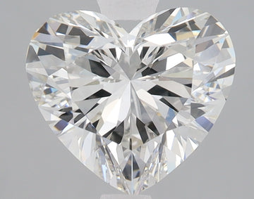 Heart-shaped lab grown diamond with brilliant facets and light reflections on gray background.