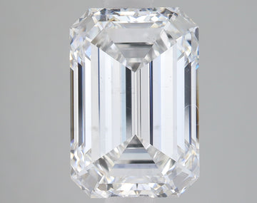 Emerald-cut clear diamond stone with faceted sides and beveled edges, displaying light refraction on neutral background.