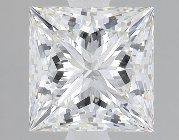 Princess-cut lab-grown diamond with faceted surface and light reflections on neutral background.