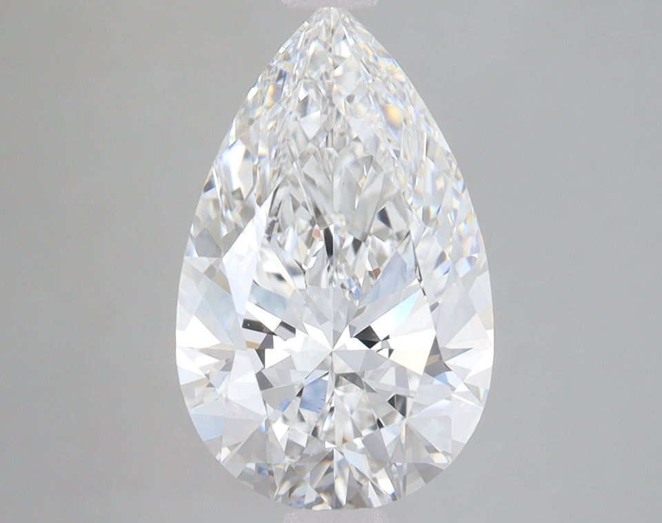 Pear-shaped colorless diamond with faceted surface and light reflections on gray background.