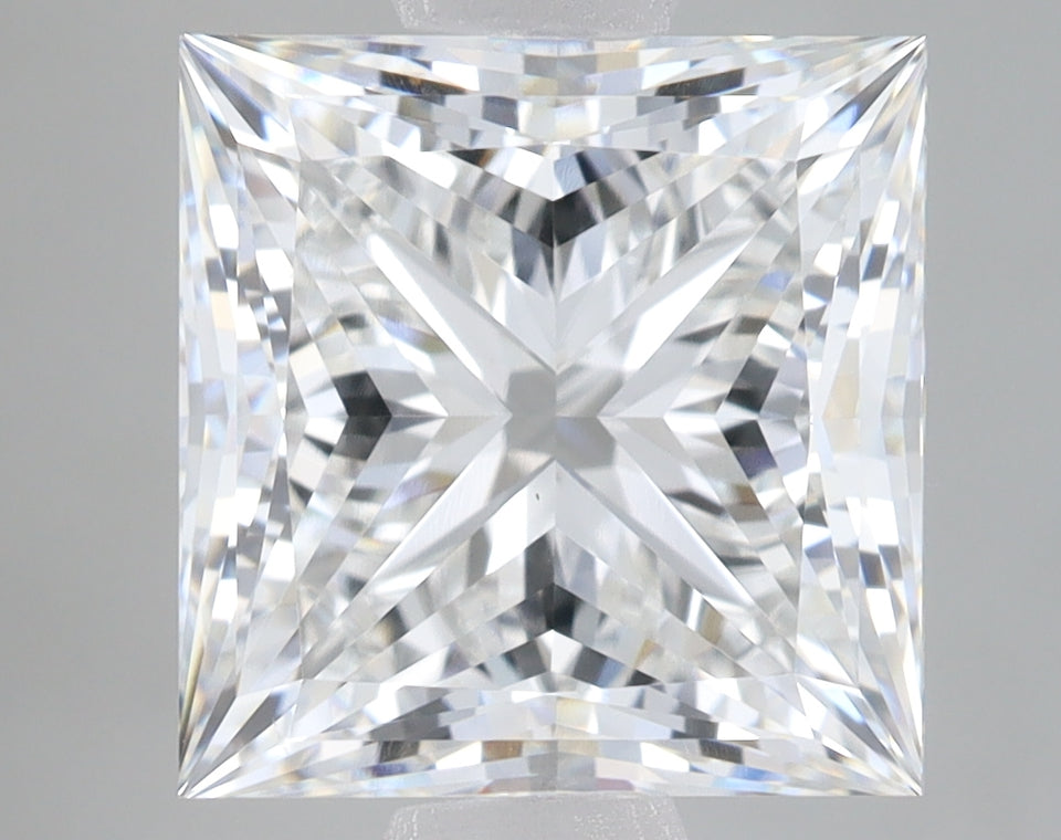 Clear princess-cut lab-grown diamond with brilliant faceting and light reflections displayed on neutral background.