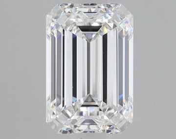 Emerald-cut lab-grown diamond with faceted surfaces and clear appearance against gray background.