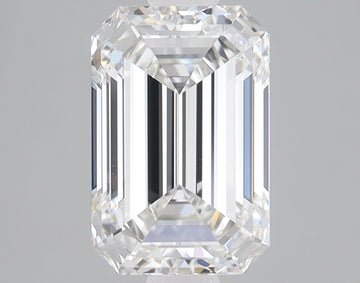 Emerald-cut lab-grown diamond with faceted surfaces and clear transparency displayed against a gray background.