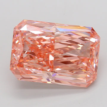 Radiant cut lab-grown diamond with pink-orange coloring and faceted surface reflecting light, displayed against neutral backg