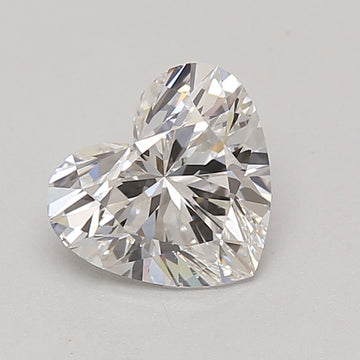 Heart-shaped lab-grown diamond loose stone with faceted surface and light reflections on neutral background.