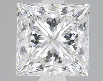 Princess-cut lab-grown diamond with faceted surfaces and light reflections on neutral background.