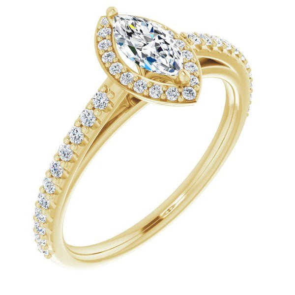Gold engagement ring with marquise-cut center stone surrounded by pavé halo and diamond-set band.