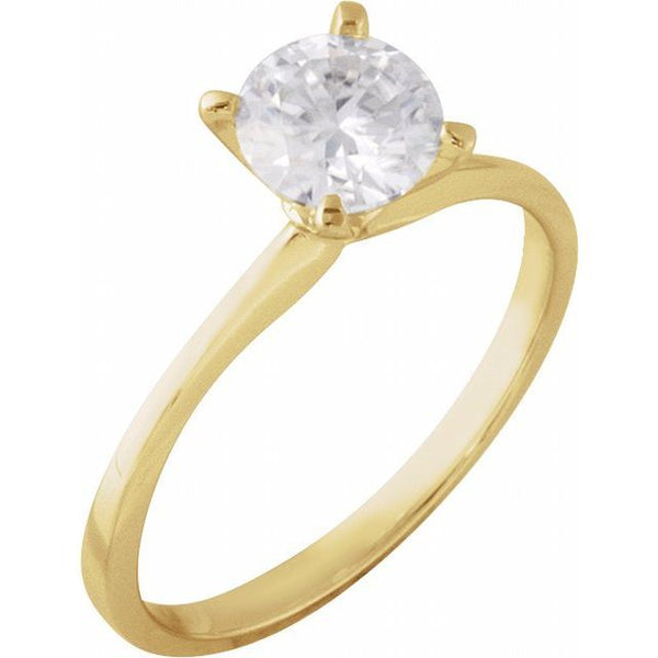 Gold engagement ring with round clear stone set in four-prong setting on polished band.