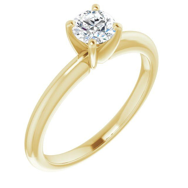 Gold solitaire engagement ring with round brilliant-cut diamond in four-prong setting.