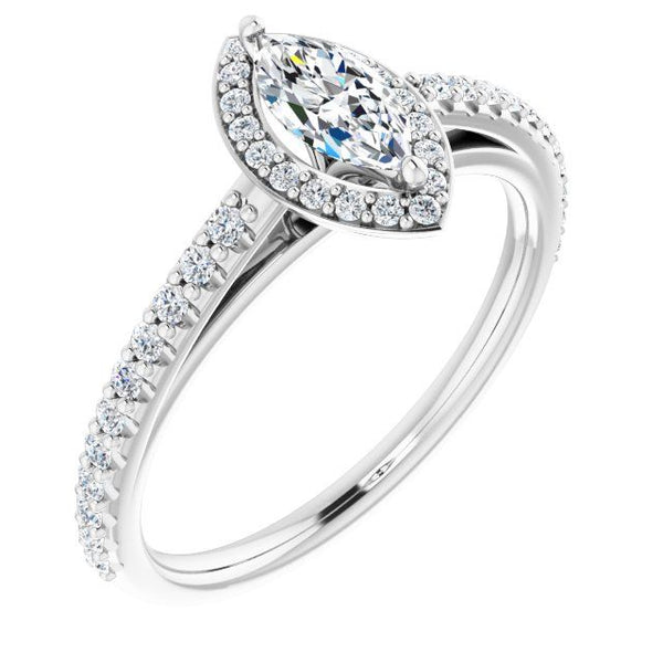 White gold engagement ring with marquise-cut center stone surrounded by halo of smaller diamonds and pavé band.