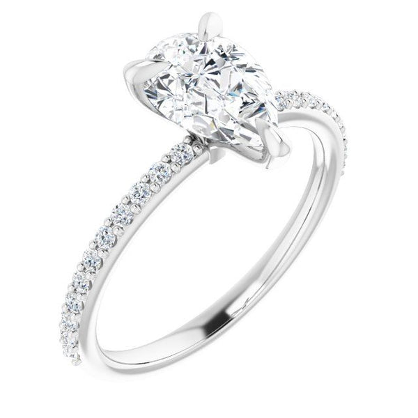 Silver engagement ring with pear-shaped stone center and small round diamonds along the band.