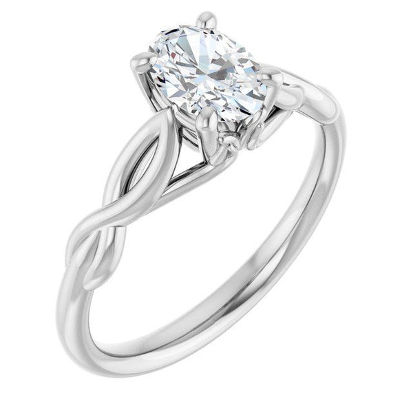 White gold solitaire ring with oval-cut clear stone in four-prong setting and twisted band.