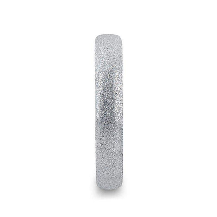Front angle of an 8mm domed tungsten carbide ring with sandblasted crystalline finish, polished interior