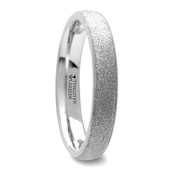 Side view of a 4mm domed tungsten carbide ring with sandblasted crystalline finish, polished interior