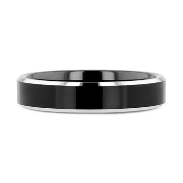 Top-down view of Valencia 4mm black tungsten ring highlighting contrast white tungsten bevels